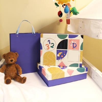 China Recyclable custom design luxury pink clothing kids babies clothes packaging box shipping cartons for clothes bags clothing for sale