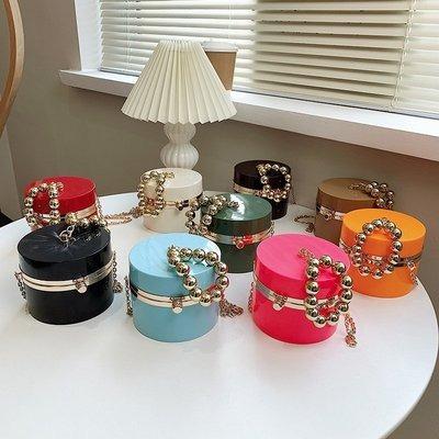 China Newest fashion round color handbags pearl barrel-shaped ladies small clip candy shoulder luxury handbags for women for sale