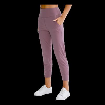 China Breathable Plus Size Yoga Pants Joggers Joggers Jogger Pants Women Elastic Quick Dry Ankle-Tied High Workout Loose With Pockets for sale