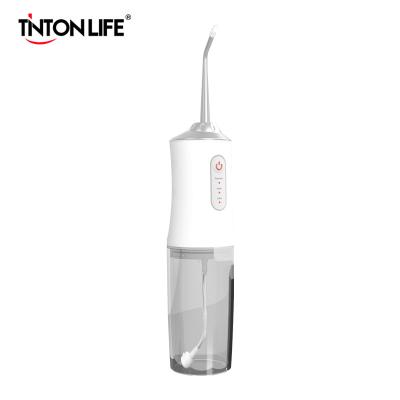 China Portable Household 3 Modes USB Rechargeable Water Flosser Water Jet Water Tank Dental Waterproof Teeth Cleaner 220ML Oral Irrigator for sale