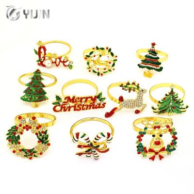 China Cheap Wholesale Viable Exquisite Enamel Faux Stone Luxury Merry Christmas Decoration Table Metal Napkin Rings for sale