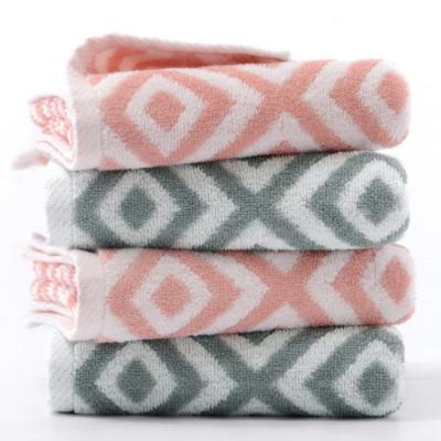 China Luxury QUICK DRY cotton jacquard woven bath towel set custom jacquard yarm dyed hand bath towels for sale