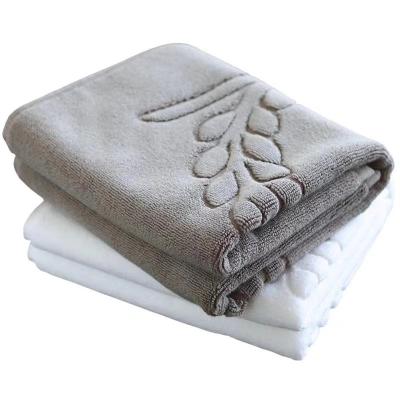 China QUICK DRY Thick Cotton Embossed Bath Mat Logo Bath Mat Towel For Hotel for sale