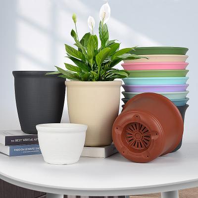 China Amazon modern hot sales style Nordic line flower pot indoor outdoor decoration green plant round plastic flowerpot for sale