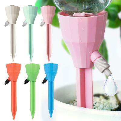 China Agriculture Drip Irrigation Garden Tools Triangle Drip Device Best Selling Watering Devices Light Green Self Shaped Watering Devices For Plant Flowerpot for sale