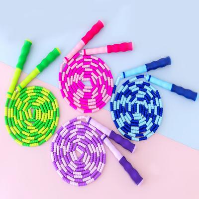 China Professional Plastic Joint Beaded Bamboo Jump Rope Sports Supply School Students Bead Festival Skipping Rope for sale