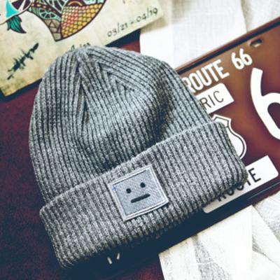 China COMMON Hot Selling Soft Stretchy Wool Knit Beanie Unisex Skull Winter Toque Hat With Logo Leather Patch Custom Made for sale