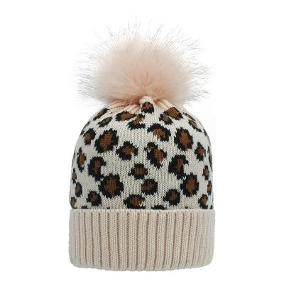 China COMMON Women Beanie Autumn Winter Wool Soft Warm Leopard Print Knitted Warm Hat Women Pom Pom Ski Hat for sale