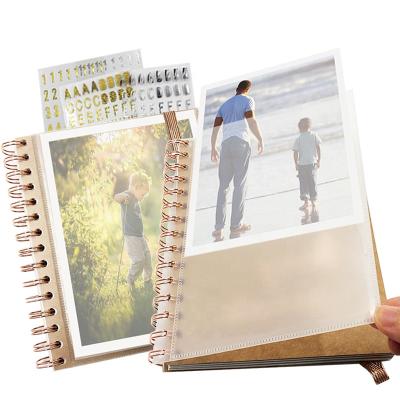 China PP Photo Insert 2021 Custom A6 Spiral Notebook For Student / Typesetting With DIY Sticker And Photo Pocket for sale