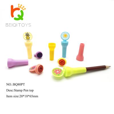 China Stamp with small plastic toys kids self mixed over pen inking stamp with toys over pen small for sale