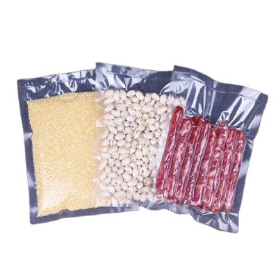 China Nylon Transparent Three Side Seal Disposable Customized Vacuum Bag for sale