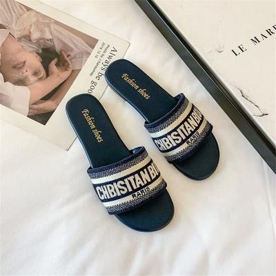 China Outdoor Slippers Plus Size Summer Letter Casual Slippers Fashion Flat Shoes Women's Slides Shoes Beach Casual Slippers Female External Wear Sandals for sale