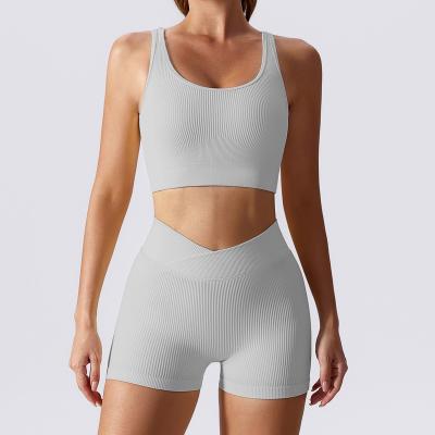 China Breathable Factory Wholesale Seamless Shaping Yoga Wear Quick Drying Running Gym Sports Clothing Sets For Women Short Workout Suit for sale