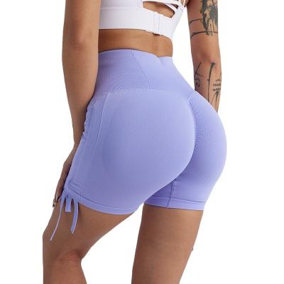 China Breathable Factory Wholesale Trendy Seamless Breathable Lace Up Sexy Women Fitness Sports Shorts New Solid High Waist Hip Lift Yoga Shorts for sale