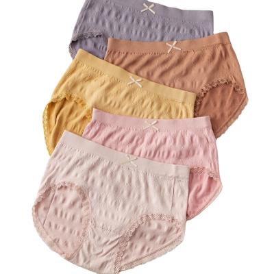 China Anti-Bacterial New Seamless Elastic Breathable Knit Comfortable Mid Waist Women Underwear Sexy Bow Decorated Lace Hemmed Girl Underwear Panties for sale