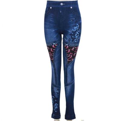 China Anti-Bacterial Trendy National Style Women Pants New Slim Fitting Elastic Average Size Printed Denim Women Leggings Customizable for sale