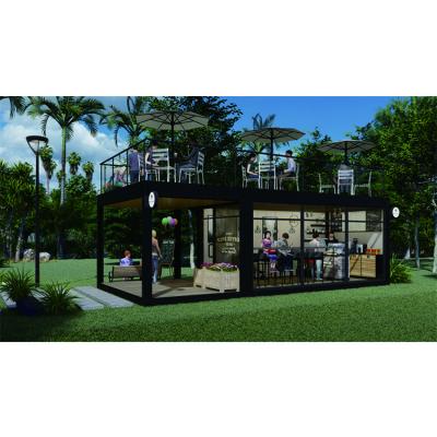 China Modern Convenient And Fast Coffee Shop House Street Cafe House 40ft Folding Caravan Container House for sale