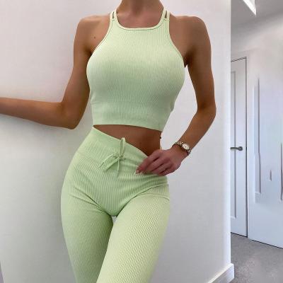 China Leisure solid color breathable leggings and high neck double shoulder sports bra set fitness women yoga set for sale