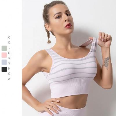 China Breathable Popular Sports Invest Gym Seamless High Support Fitness Stripe Sports Bra Women Yoga Top for sale