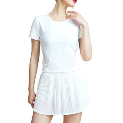 China Places 2021 hot sale summer yoga shorts white short sleeve top plus size two-piece pleated tennis skirt suit women for sale