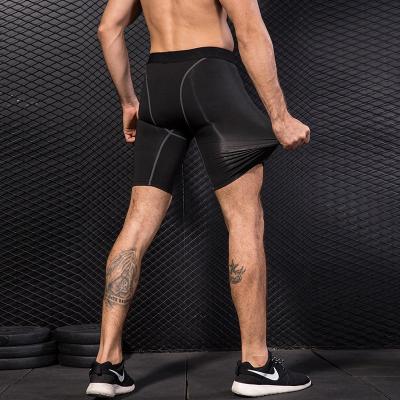 China Hot Selling QUICK DRY Hot Selling Gym Gaiters Sports Fitness Running Workout Shorts High Elastic Speed ​​Quick Dry Mens Compression Shorts for sale