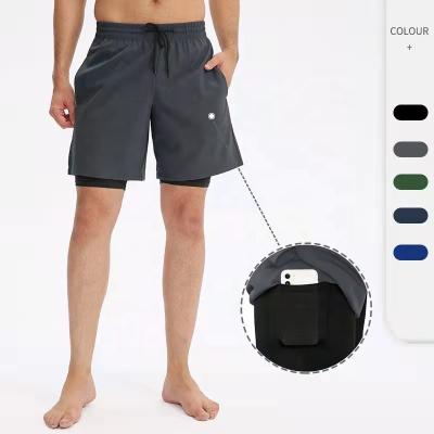 China Two Piece Fitness Shorts Tight High Elastic Basketball Jogging Quick Dry Layer Fake QUICK DRY Double Sports Joggers Mens for sale