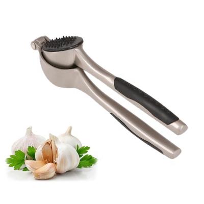 China Premium Instruments Viable Home Kitchen Garlic Press Crusher Accessories Pressing Vegetable Onion Garlic Cleaver Ginger Crusher for sale