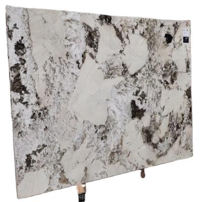 China Modern natural tianshan snow onyx brazil sunset super white marble table top decoration for sale