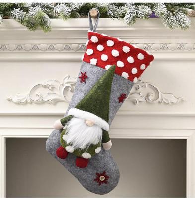 China Polyester Tender Christmas Stocking Ornaments Kids Christmas Decoration Eve Gift Bag Christmas Stocking Decorations for sale