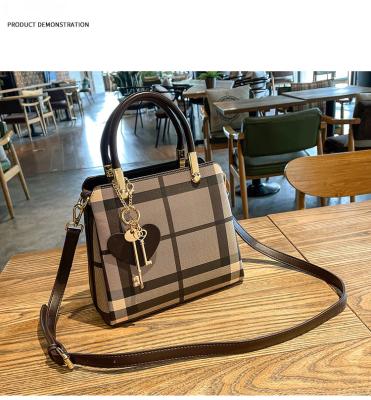 China Fashion PVC Lattice Women Bags Brand Name Purses and Hot Luxury Ladies Handbags for sale