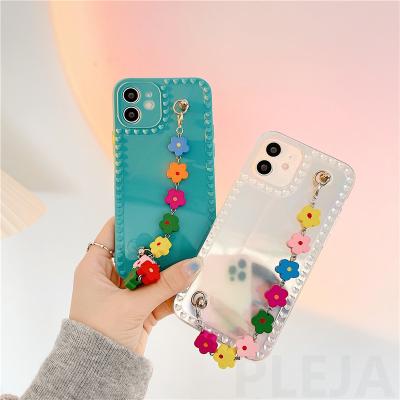 China Cute Flower Wristband Phone Case For Phone Hand Colorful Chain Laser Cover Soft Phone for sale