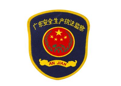 China Inspection Security Weaving Custom Iron On Patches With Gold Eyelet for sale