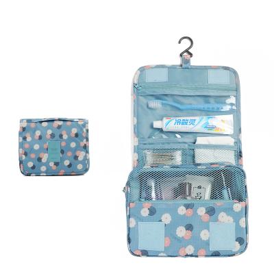 China New Polyester Hanging Travel Toiletry Bag Fashion Floral Pattern Traveling Bag for sale