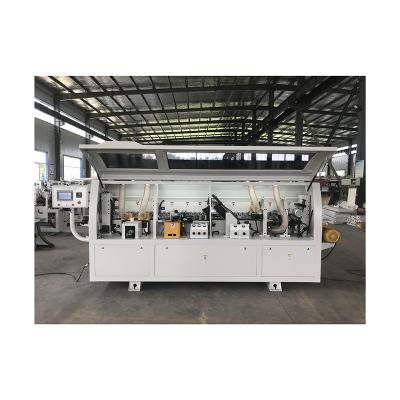 China Dark building material stores wood based edging machine panel dark edging machine for woodworking for sale