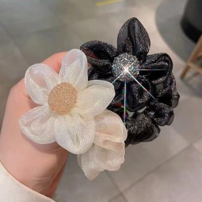 China Advanced net yarn sense of E. Korea hair circle daisy flower hair rope net yarn quality diamond hair ornament balls elastic rope. for sale