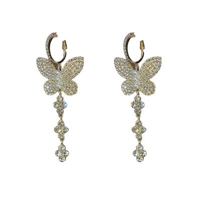 China 2022 Wholesale Cheap Trendy Silver Needle Butterfly Woman Fashion Drop Long Chain Earrings Model 925 for sale