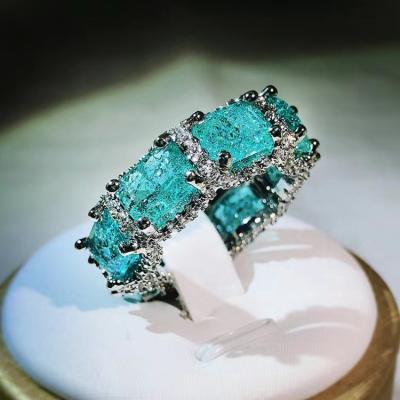 China Romantic Hot Female Ring Simulation Paraiba Small Red Books Gemstone Recommended Jewelry Set Inlaid Stone Blue Topaz Sea Topaz Ring for sale