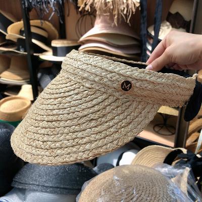 China Fashion Straw Visor Hat Women Summer Visor Hat Bend Able Wide Brim Straw Cap Open Top Bun for sale