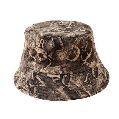 China Casual Cute Novelty Bucket Hat Newspaper Magazine Sun Proof Packable Art Style Design Soft Fisherman Hat For Men And Women for sale