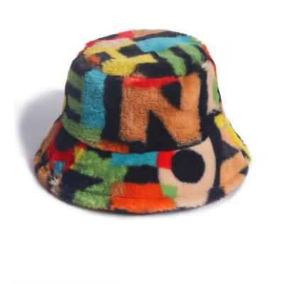 China Breathable Warm Stylish Fluffy Warm Bucket Hat Faux Fur Outdoor Winter Hats With Colorful Letters Design for sale