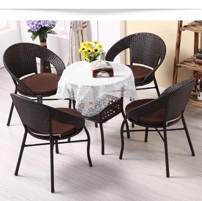 China Modern cane chair balcony table tea table chair set outdoor balcony cane five-piece chair leisure stool set three-piece set for sale