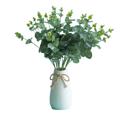 China Nonwoven Fabric Factory Wholesales Artificial Gypsophila Silk Eucalyptus Leaves Faux Greenery Eucalyptus For Wedding Home Decor for sale