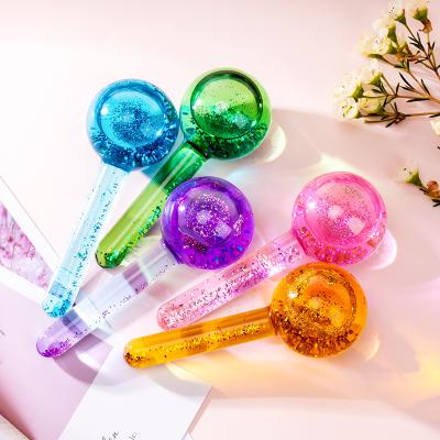 China Pink Crystal Therapy Roller Face Globe Skin Revitalizer Ice Massage Glass Beauty Tools Facial Ice Ball for sale