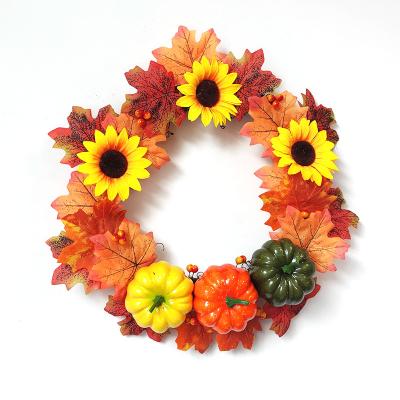 China Hot Selling Plastic Artificial Pumpkins and Sunflower Maple Leaf Garland Home Decorative Wreath for sale