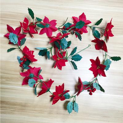 China Plastic Artificial Red Flower Vine Christmas Vines Plant Outlet Indoor Outdoor Wall Hanging for sale