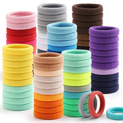 China 100pcs/bag Large Baby Kids Hair Decoration Elastic Nylon Hair Bands Scrunchie Colorful Seamless Hair Tie for sale