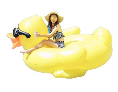 China Water Fun Sets Customization High Quality Adult Duck Factory Ring Ride Inflatable Swimming Floats for sale