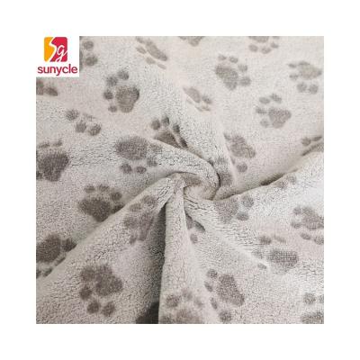 China Dog Paw Pattern Waterproof Soft Warm Design Cloth Wholesale 100% Polyester Flannel Shearling Fabric for sale