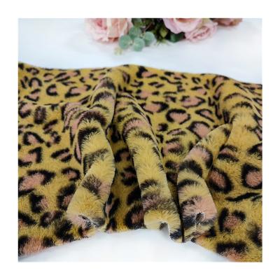 China 100% Polyester Wholesale Upholstery Printing Faux Fur Fabric Tiger Fur Fabric PV Fleece Auto Plush Animal For Clothing for sale