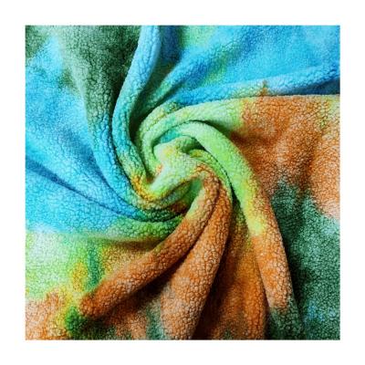 China New next china bond dye technology fleece anti-static printed sherpa fabric beautiful for garment for sale